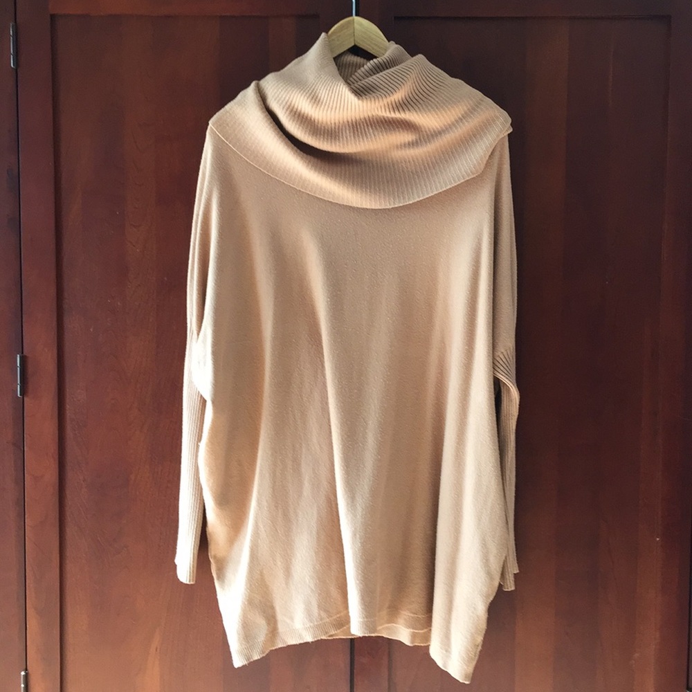 Neutral Tan sweater. Goes great with boots!
